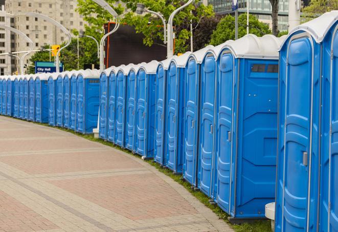 a row of portable restrooms at an outdoor special event, ready for use in Arroyo Grande